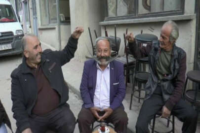 1 metrelik bıyıklarıyla Guinness'e girmek istiyor