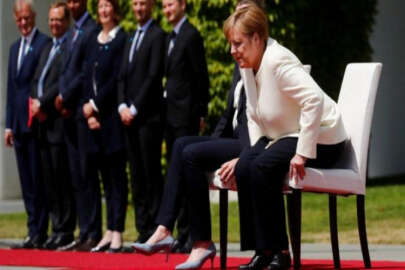 Merkel'in titremesine sandalyeli önlem
