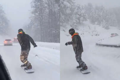 Uludağ'dan snow board yaparak indi!