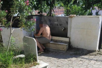 Bursa Gemlik'te mezarlıkta duş alan şahıs şaşkınlık yarattı!