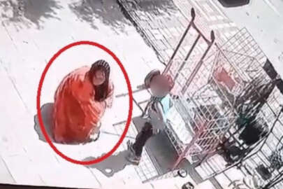 Bursa'da bir kadın dükkan önünde duran köpeği önce sevdi sonra çaldı