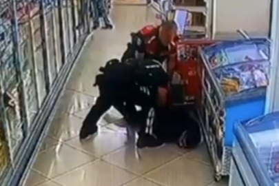 Polise yakalanmamak için markete girdi ruhsatsız tabancayla yakalandı