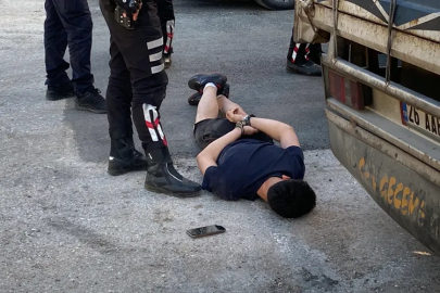 Polisin 'dur' ihtarına uymadı! Camdan terazi attı...