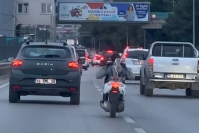 Bursa'da yatarak motosiklet süren maganda kamerada!