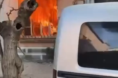 Kedisini kurtarmak için alevlerin arasına daldı!