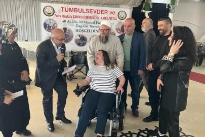 Bursa'da 40 akülü 40 manuel engelli aracı törenle sahiplerine teslim edildi